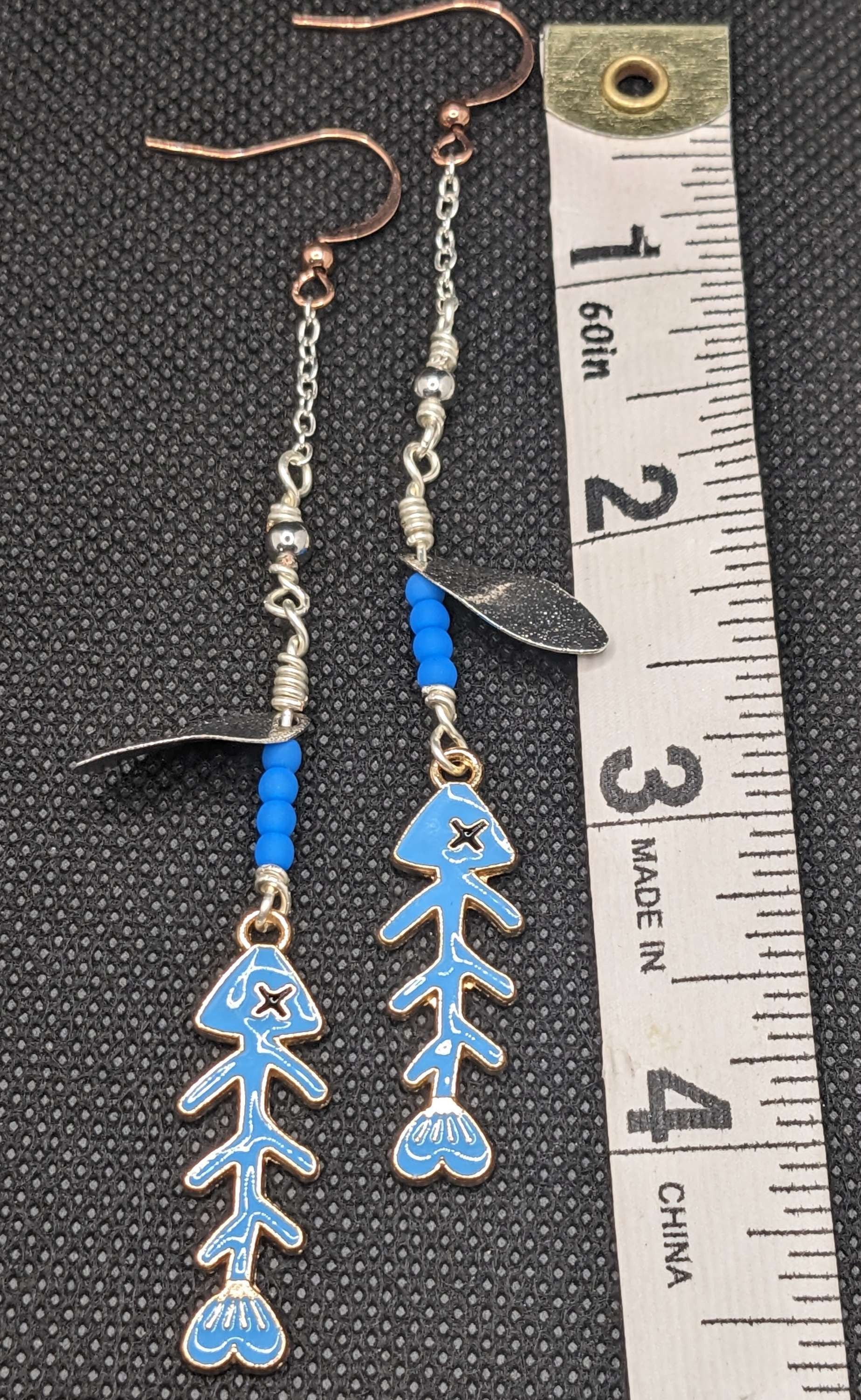 Bonefish on Neon blue Spinner Earrings - Earrings